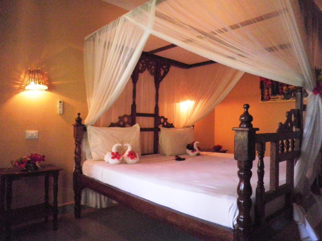 Palumboreef Beach Resort Uroa Quarto foto